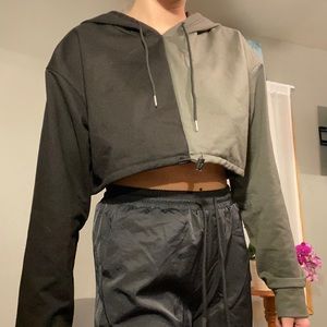 Cropped half black/half green sweatshirt